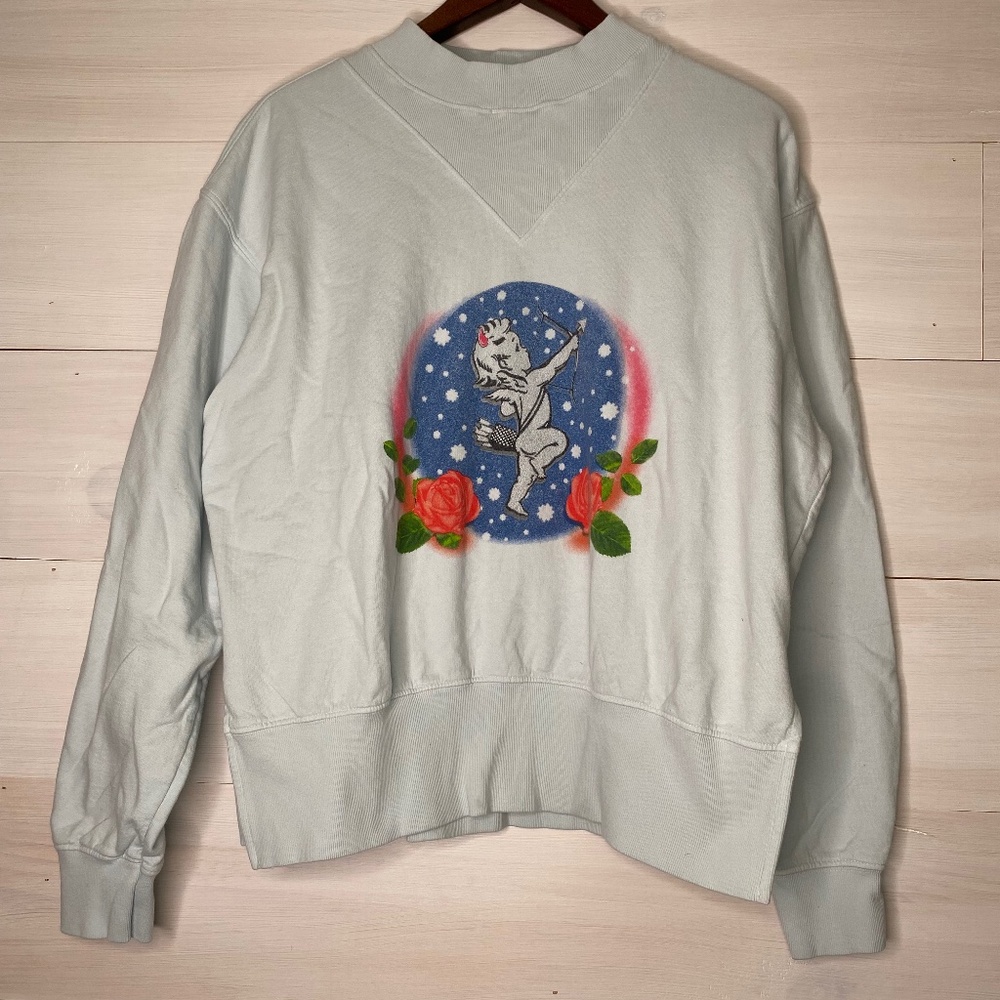 Boys Lie Women’s Size S/M Pull On Sweater Light Blue With A Cupid Design